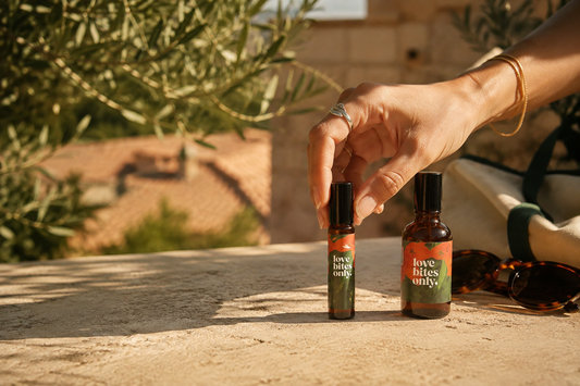 Love Bites Only natural insect repellent on a sunlit European terrace, ready for September travel.